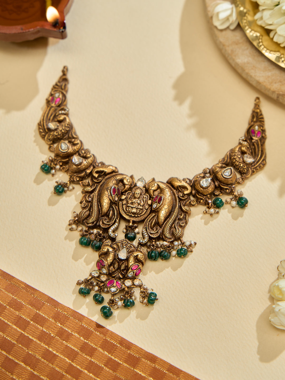 Elegant Emerald Beads and Ruby Lakshmi