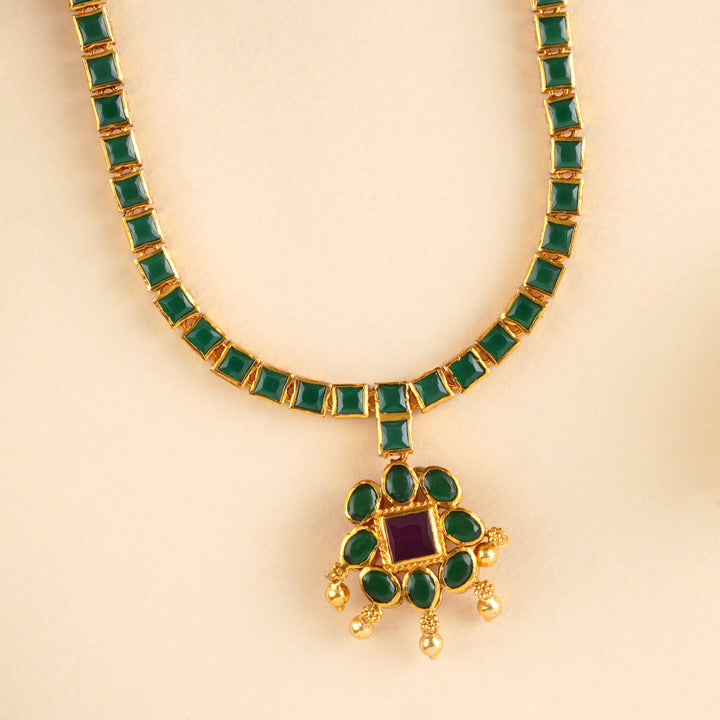 Halo Emerald Stone with Golden Drop Necklace