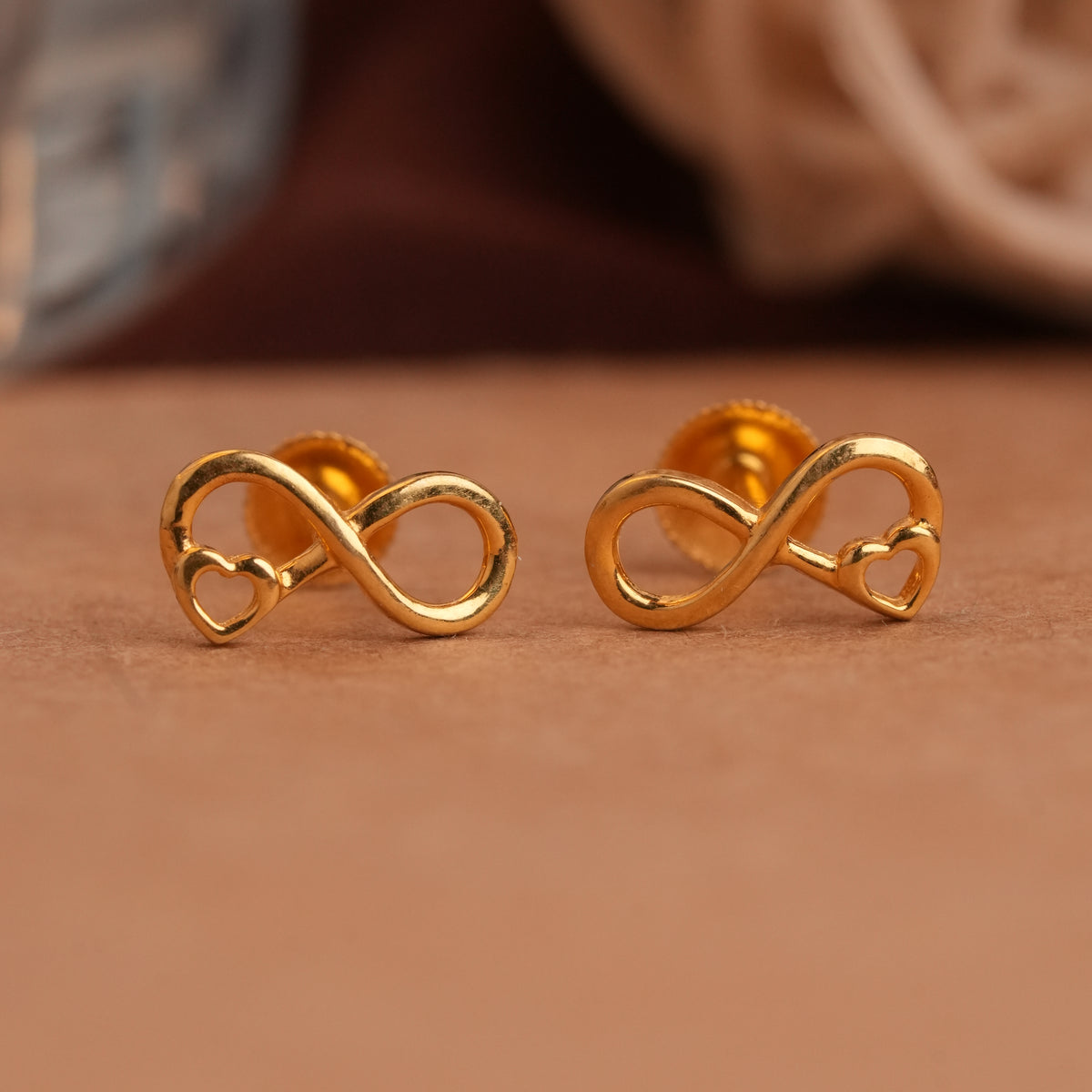 Infinity with heart designed gold side stud