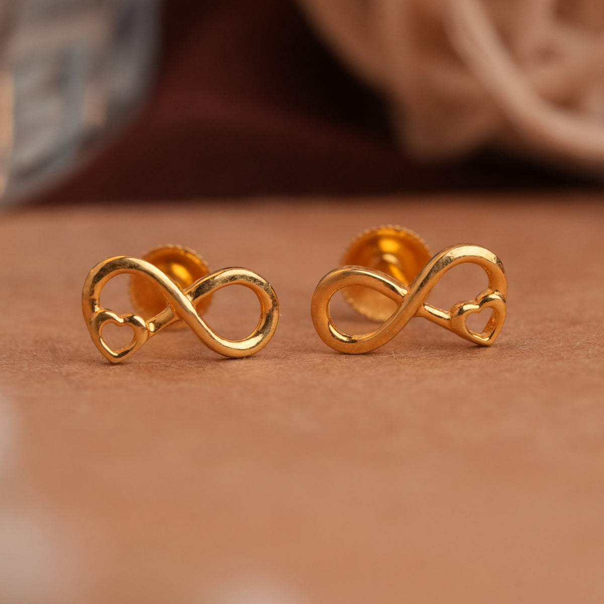 Infinity with heart designed gold side stud