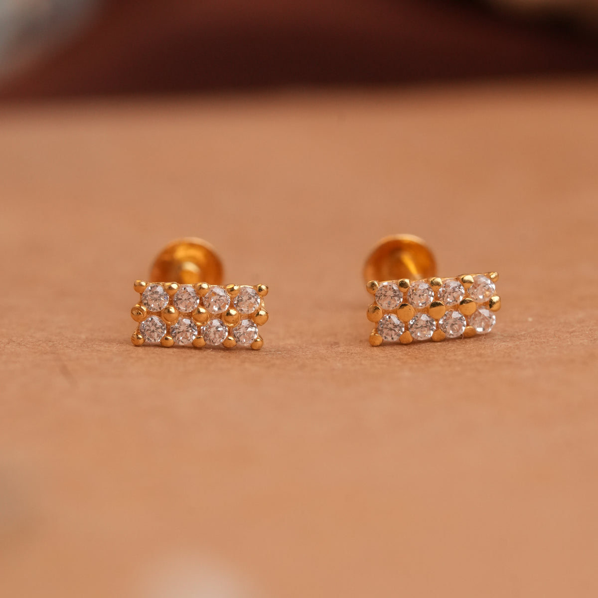 Minimalist rectangular gold side stud