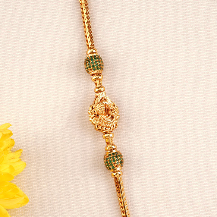 Emerald balls with Peacock Mugappu Chain