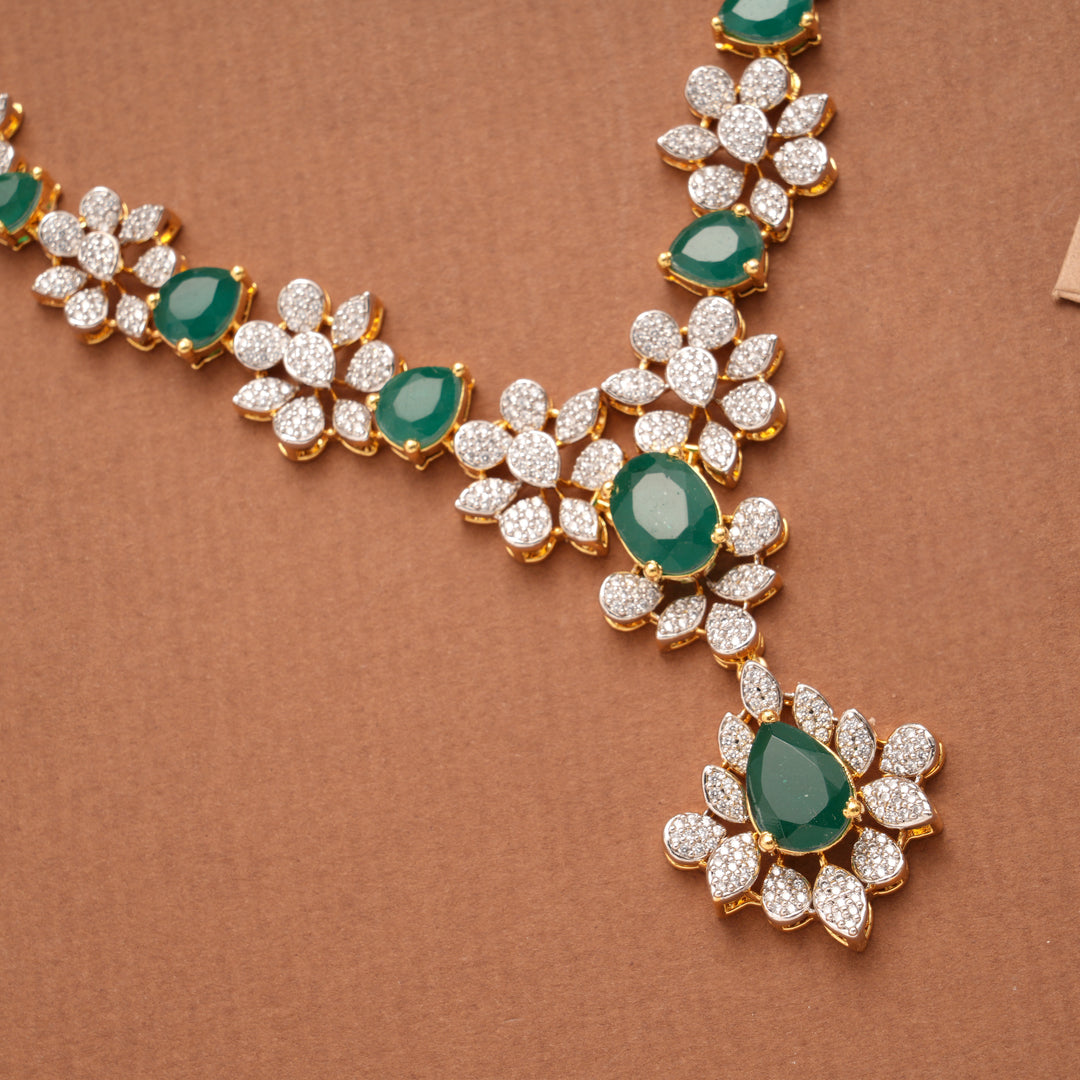 Regal Floral Emerald Tear Drop Design Golden Necklace