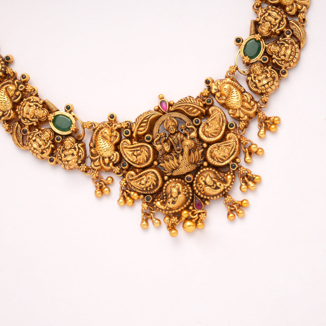 Goddess Lakshmi with Emerald Golden Necklace