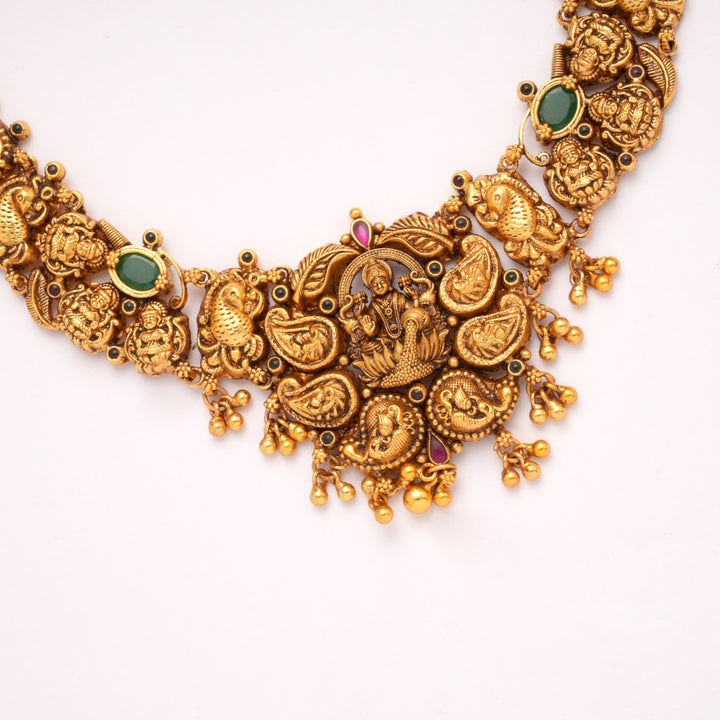 Goddess Lakshmi with Emerald Golden Necklace