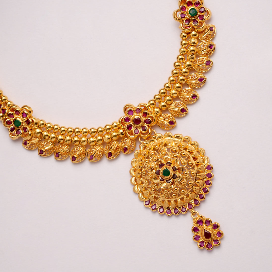 Lovely Blossom with Round Pendant Golden Necklace