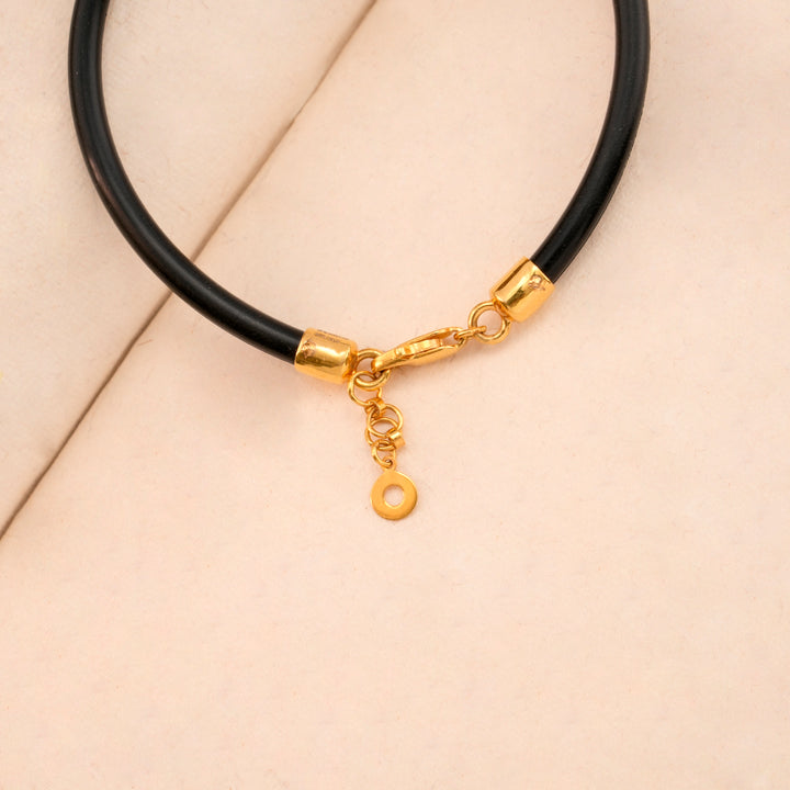 Elegant Women’s Black Leather Gold Kada