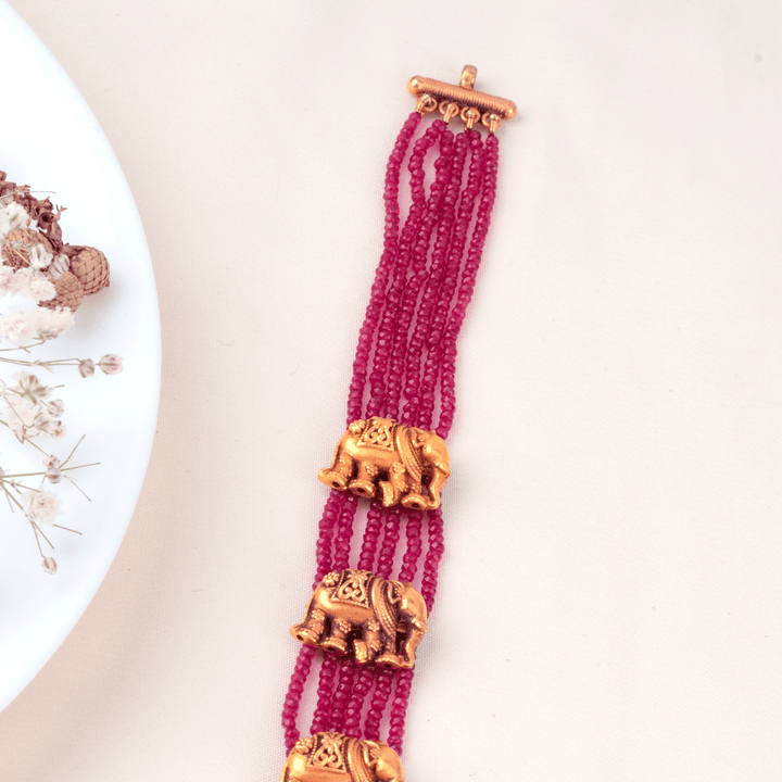 Ruby Beads with Elephant Motif Gold Haram