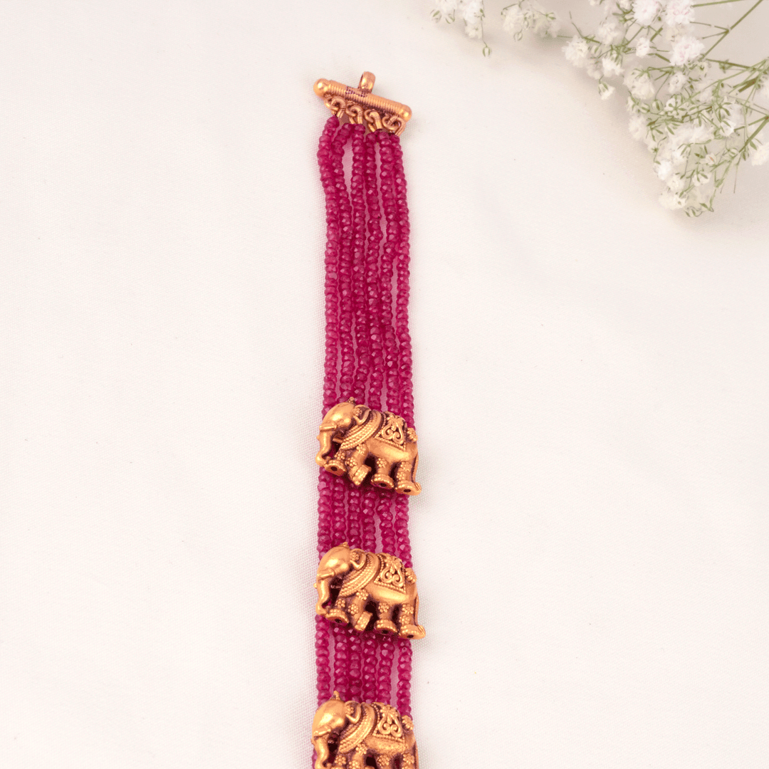 Ruby Beads with Elephant Motif Gold Haram