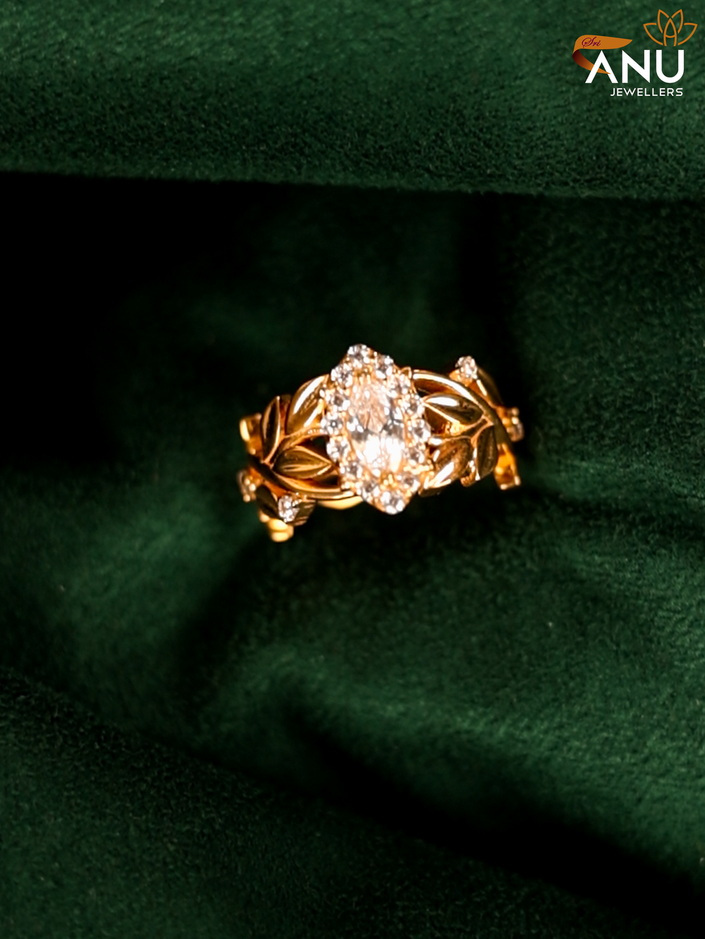 Oval White Stone with Leaf Design Gold Ring