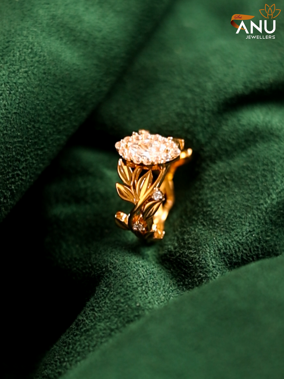Oval White Stone with Leaf Design Gold Ring